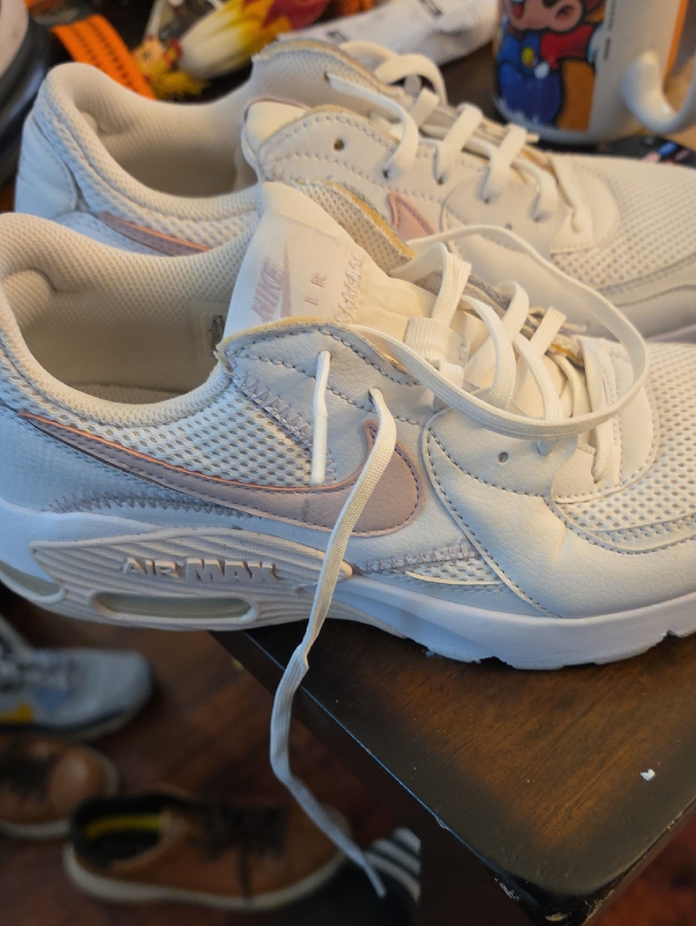 Nike Women's White Sneakers with Pale Pink Swoosh